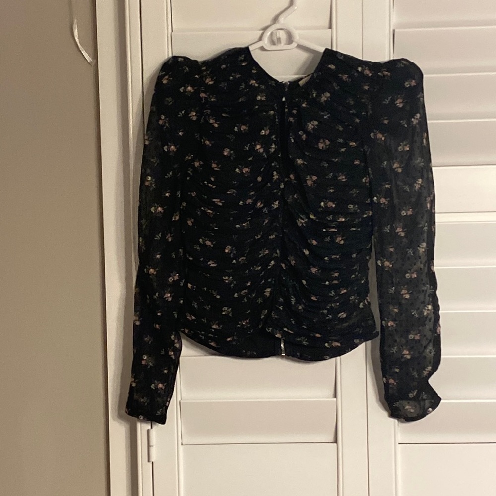 Excellent condition top. Size small.